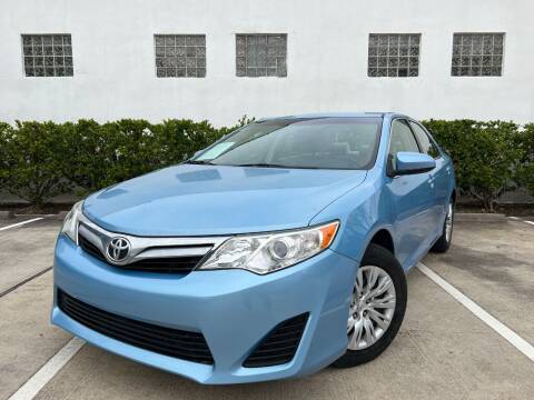 2012 Toyota Camry for sale at UPTOWN MOTOR CARS in Houston TX