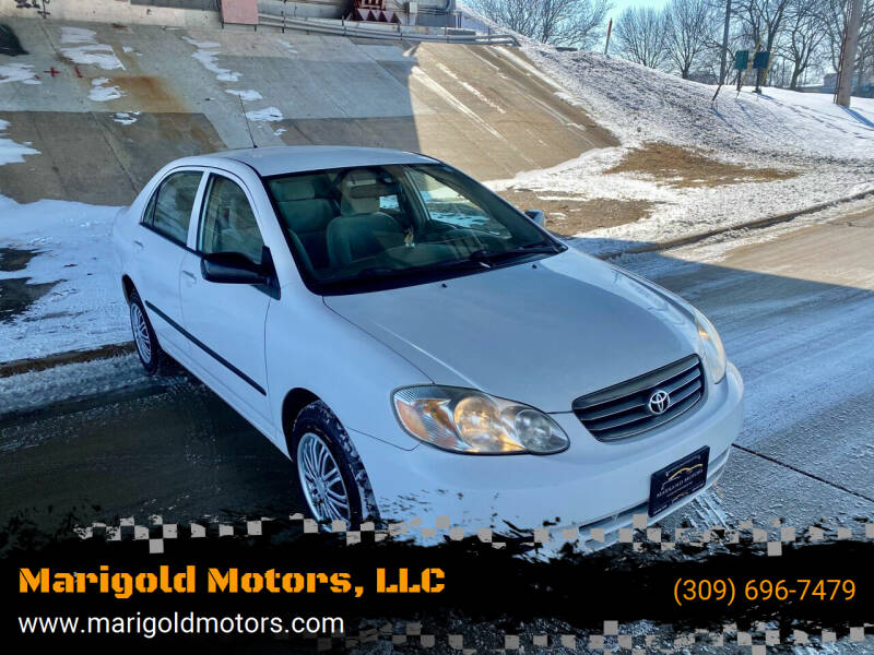 2004 Toyota Corolla for sale at Marigold Motors, LLC in Pekin IL