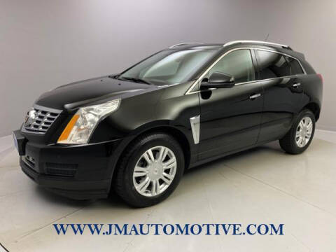 2015 Cadillac SRX for sale at J & M Automotive in Naugatuck CT