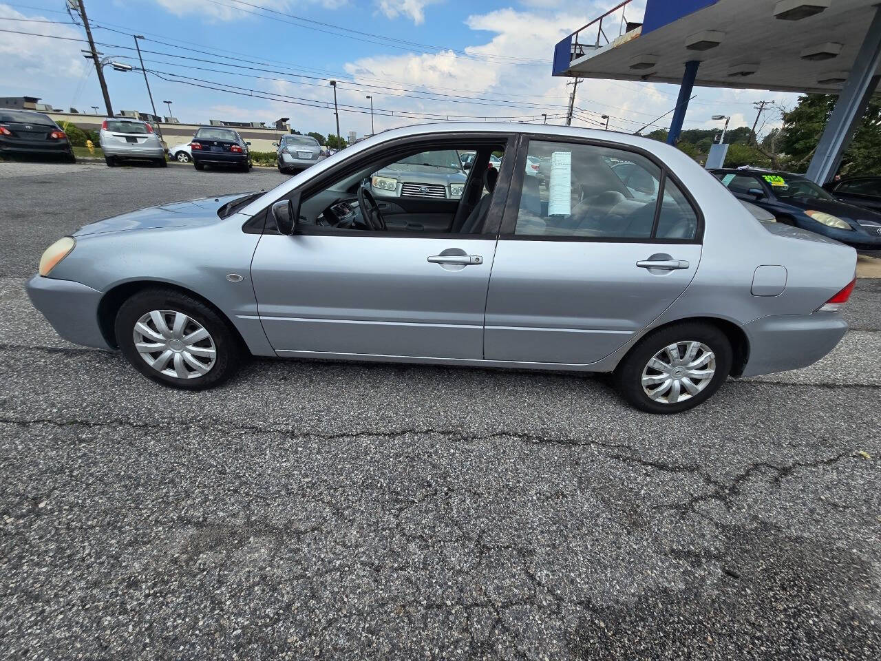 2004 Mitsubishi Lancer for sale at QUEENSGATE AUTO SALES in York, PA