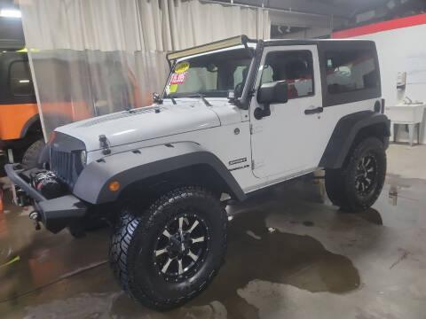 2011 Jeep Wrangler for sale at Hometown Automotive Service & Sales in Holliston MA