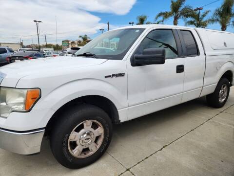 2009 Ford F-150 for sale at E and M Auto Sales in Bloomington CA