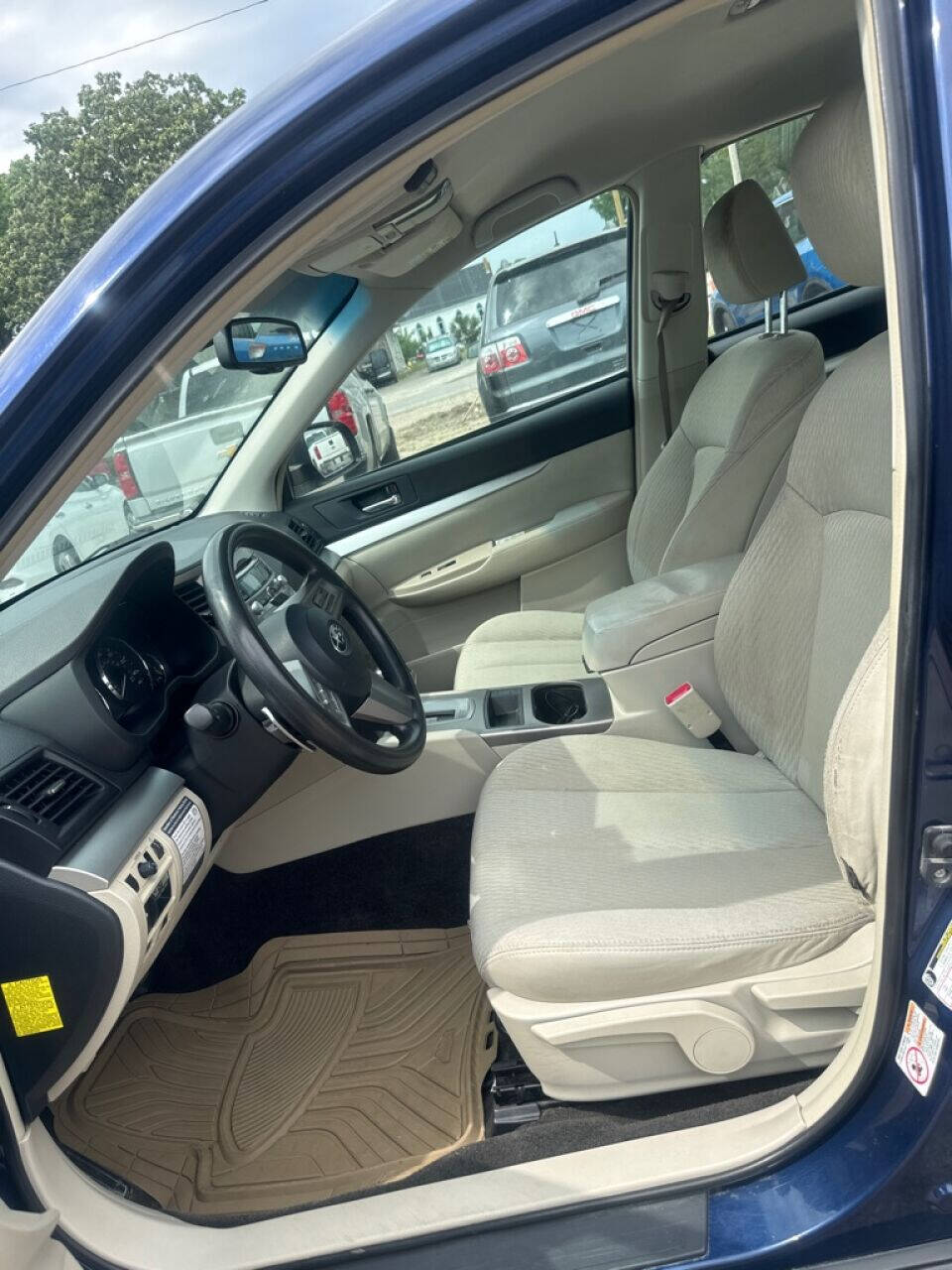 2011 Subaru Outback for sale at Calderon Auto Sales in Des Moines, IA