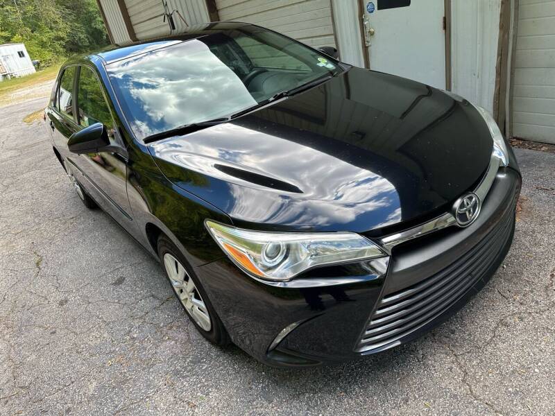 2015 Toyota Camry for sale at BHT Motors LLC in Imperial MO