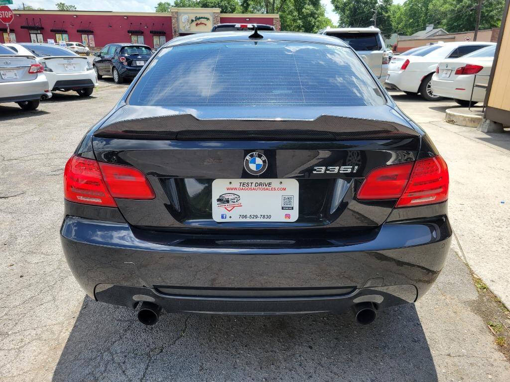 2011 BMW 3 Series for sale at DAGO'S AUTO SALES LLC in Dalton, GA