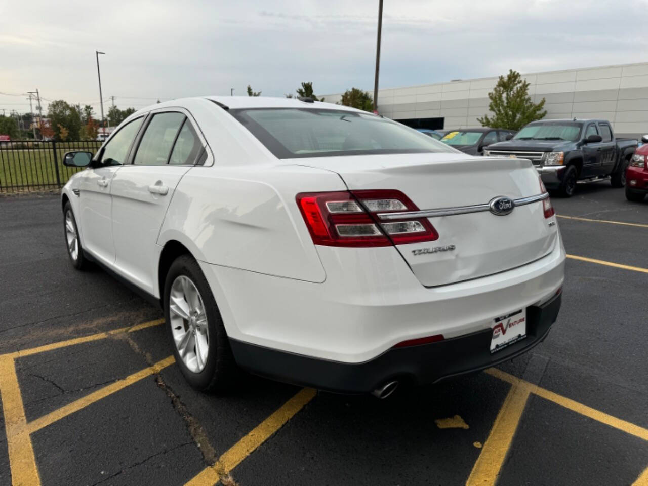 2014 Ford Taurus for sale at Carventure in Lansing, MI