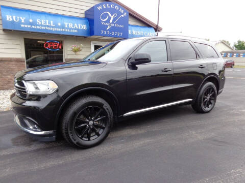 2015 Dodge Durango for sale at VanderHaag Car Sales LLC in Scottville MI