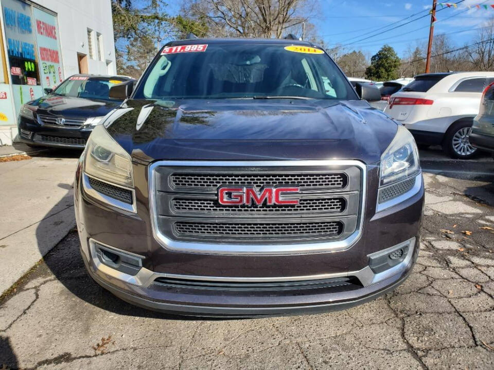 2014 GMC Acadia for sale at DAGO'S AUTO SALES LLC in Dalton, GA