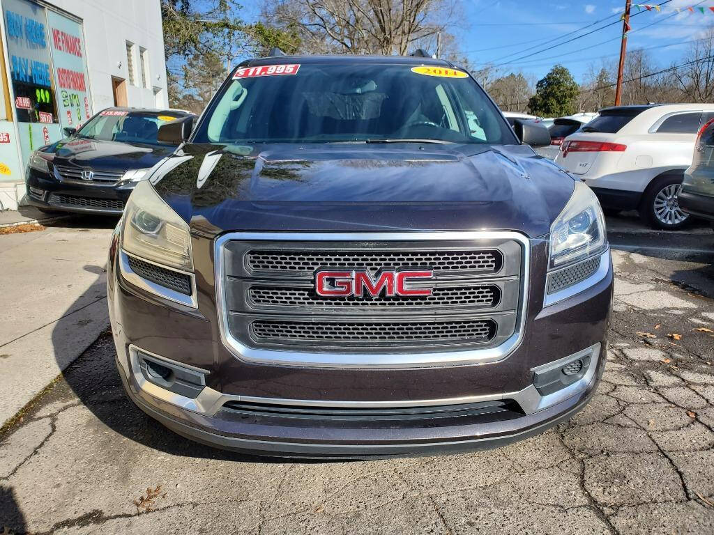 2014 GMC Acadia for sale at DAGO'S AUTO SALES LLC in Dalton, GA