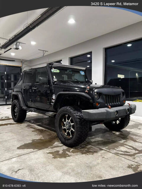 2010 Jeep Wrangler Unlimited for sale at Newcombs North Certified Auto Sales in Metamora, MI