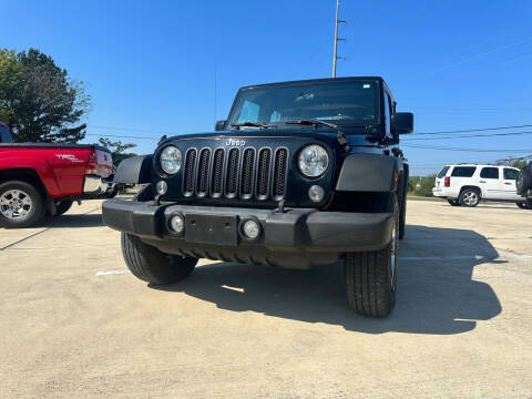 2015 Jeep Wrangler Unlimited for sale at A&C Auto Sales in Moody AL