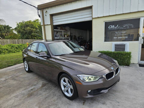 2015 BMW 3 Series for sale at O & J Auto Sales in Royal Palm Beach FL