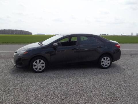 2017 Toyota Corolla for sale at Howe's Auto Sales in Grelton OH