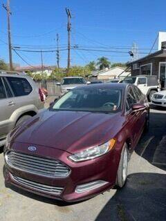 2013 Ford Fusion for sale at Affordable Auto Inc. in Pico Rivera CA