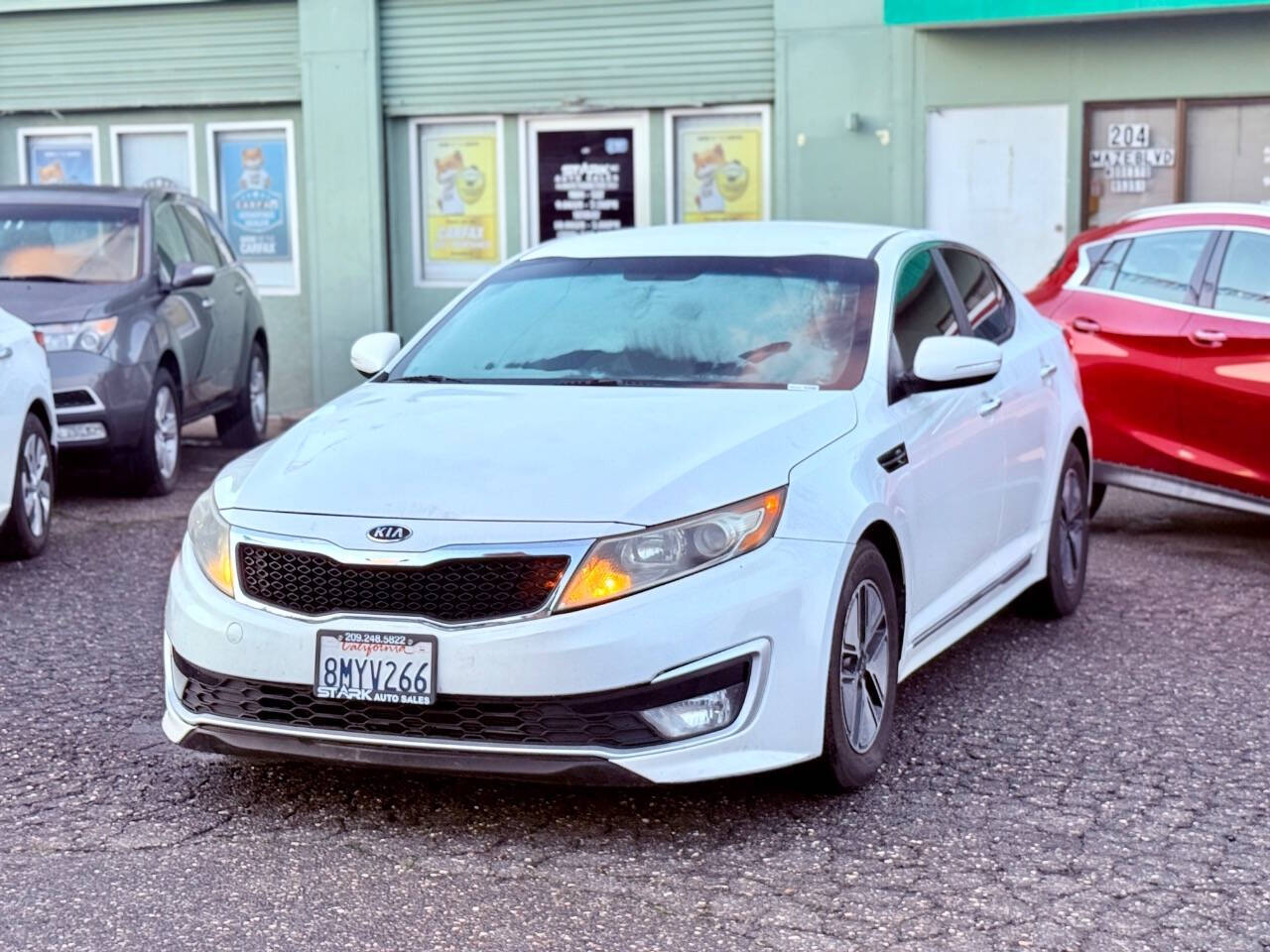 2012 Kia Optima Hybrid for sale at STARK AUTO SALES INC in Modesto, CA