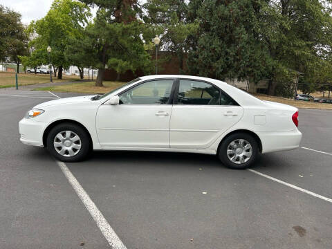 2004 Toyota Camry for sale at TONY'S AUTO WORLD in Portland OR