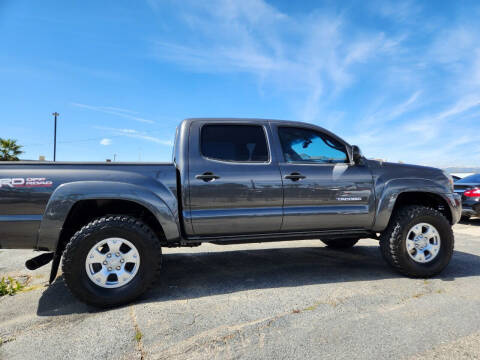2010 Toyota Tacoma for sale at E and M Auto Sales in Bloomington CA