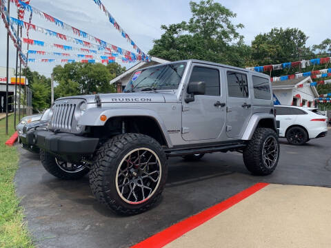 2014 Jeep Wrangler Unlimited for sale at Hensley Auto Group in Middletown OH