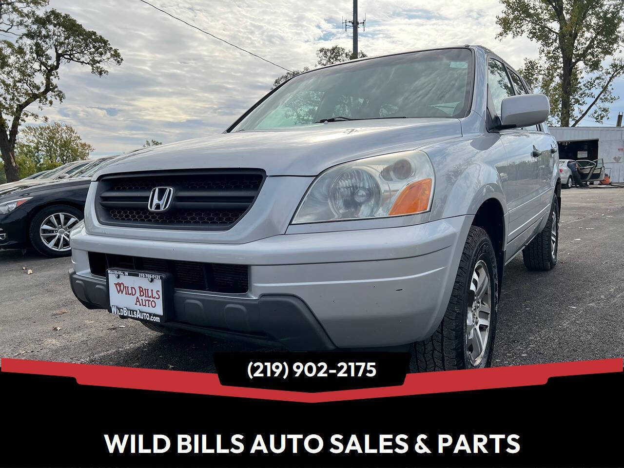 2004 Honda Pilot EX L 4dr 4WD SUV w/Leather's photo