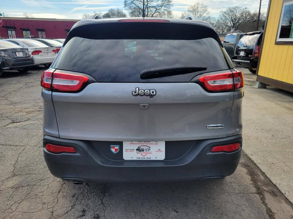 2015 Jeep Cherokee for sale at DAGO'S AUTO SALES LLC in Dalton, GA