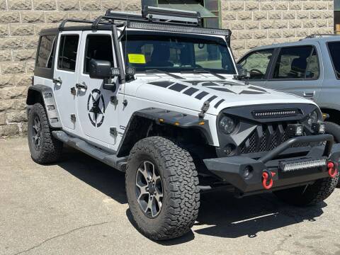 2014 Jeep Wrangler Unlimited for sale at MEE Enterprises Inc in Milford MA