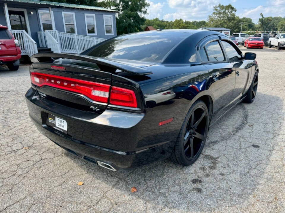 2013 Dodge Charger for sale at ICars Motors LLC in Gainesville, GA