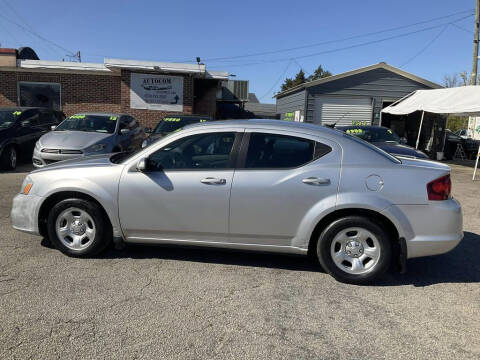 2012 Dodge Avenger for sale at Autocom, LLC in Clayton NC