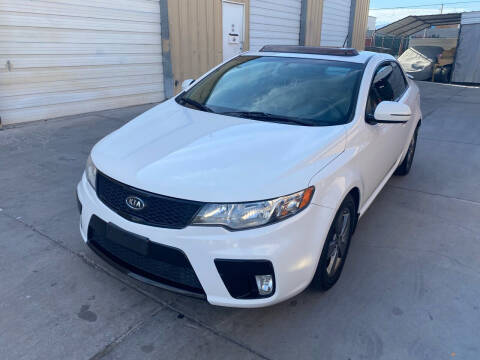 2011 Kia Forte Koup for sale at CONTRACT AUTOMOTIVE in Las Vegas NV