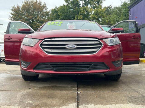 2014 Ford Taurus for sale at Carmen's Auto Sales in Hazel Park MI