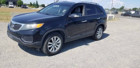 2011 Kia Sorento for sale at KHAN'S AUTO LLC in Worland WY