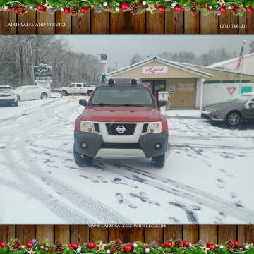 2012 Nissan Xterra for sale at LAIRD SALES AND SERVICE in Muskegon MI