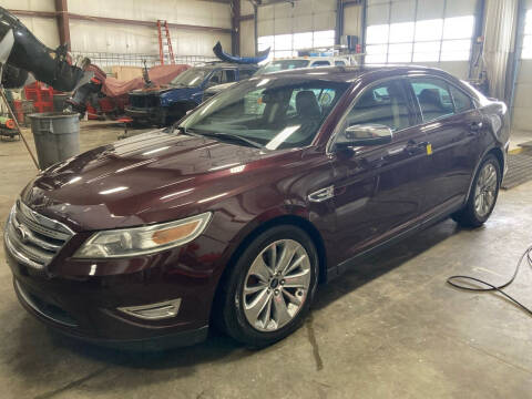 2011 Ford Taurus for sale at BERG AUTO MALL & TRUCKING INC in Beresford SD
