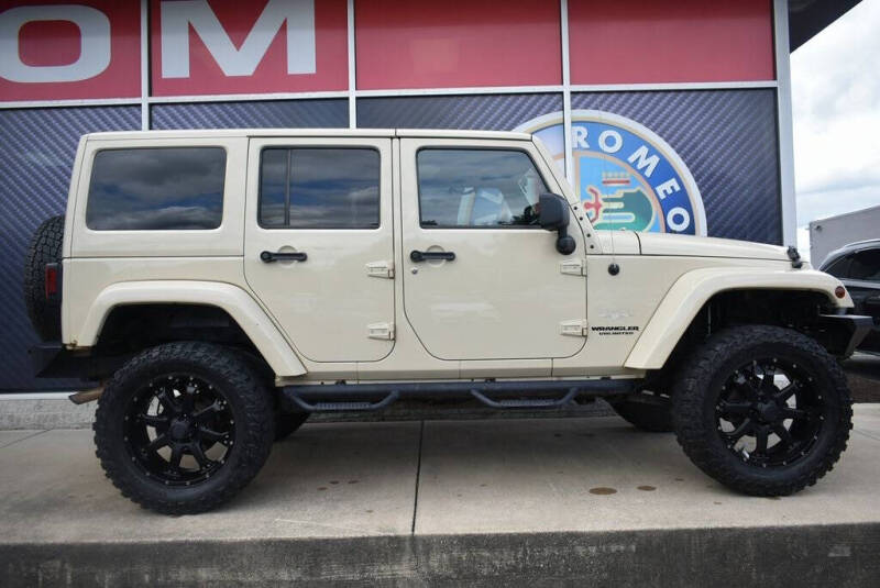 Used 2011 Jeep Wrangler Unlimited Sahara with VIN 1J4BA5H13BL545783 for sale in Strongsville, OH