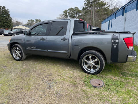 2013 Nissan Titan for sale at LAURINBURG AUTO SALES in Laurinburg NC