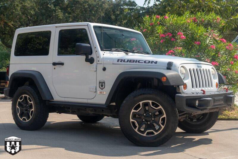 2013 Jeep Wrangler for sale at SELECT JEEPS INC in League City TX