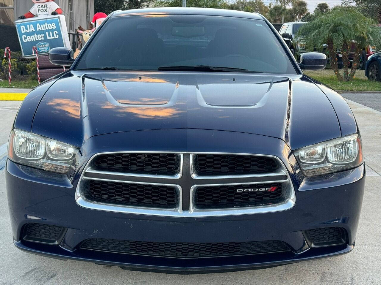 2014 Dodge Charger for sale at DJA Autos Center in Orlando, FL