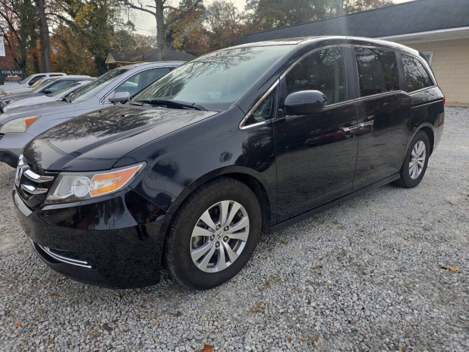 2016 Honda Odyssey for sale at DealMakers Auto Sales in Lithia Springs, GA