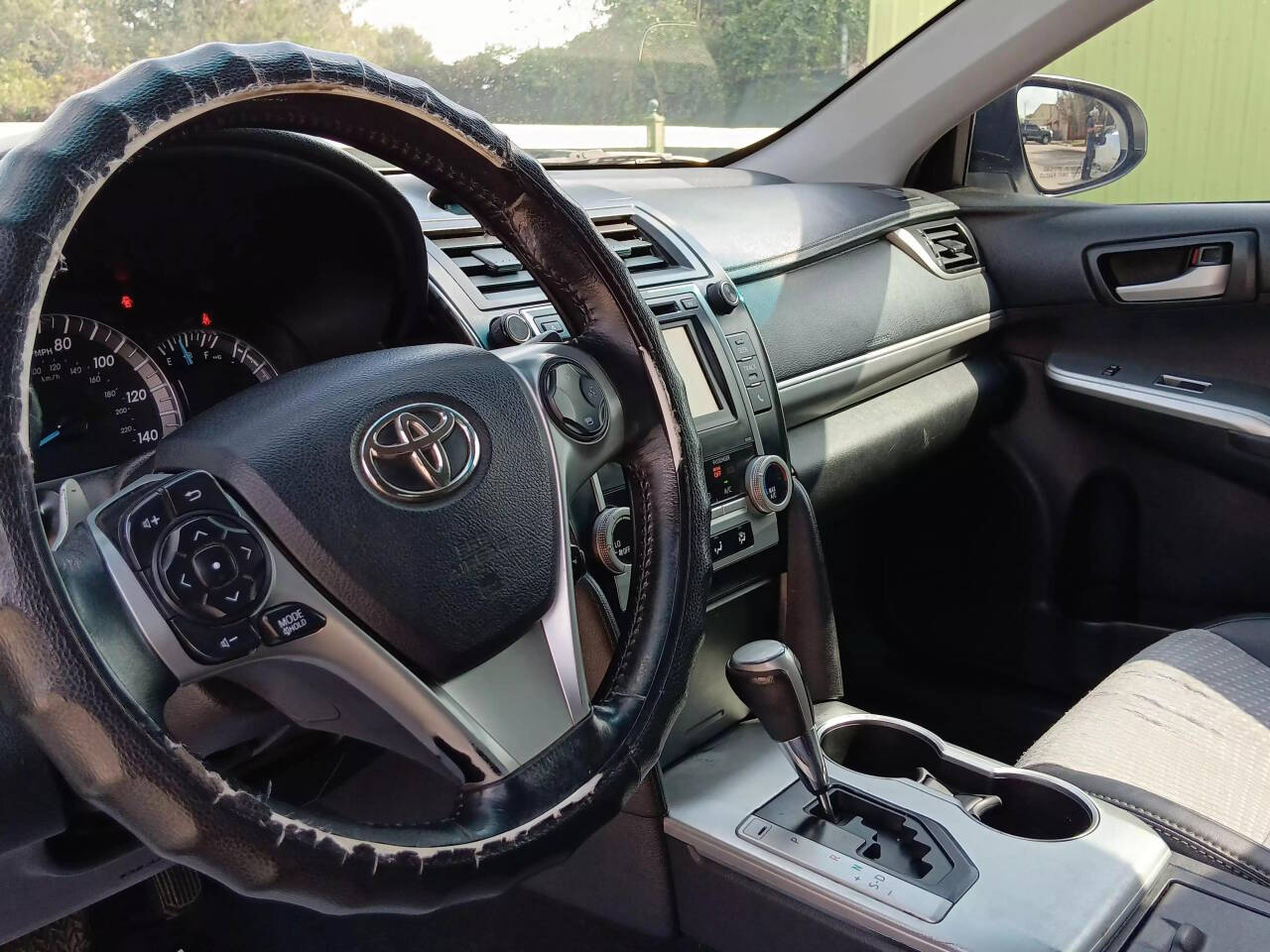 2014 Toyota Camry for sale at AUTOPLUG 360 in Stafford, TX