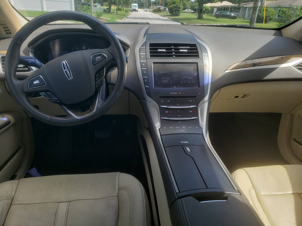 2014 Lincoln MKZ Hybrid for sale at We Buy & Sell Cars Inc in Orlando, FL