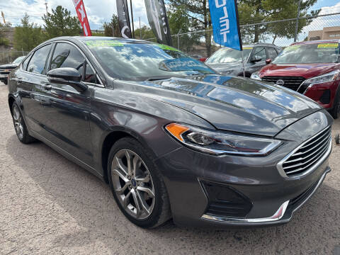 2019 Ford Fusion for sale at Duke City Auto LLC in Gallup NM