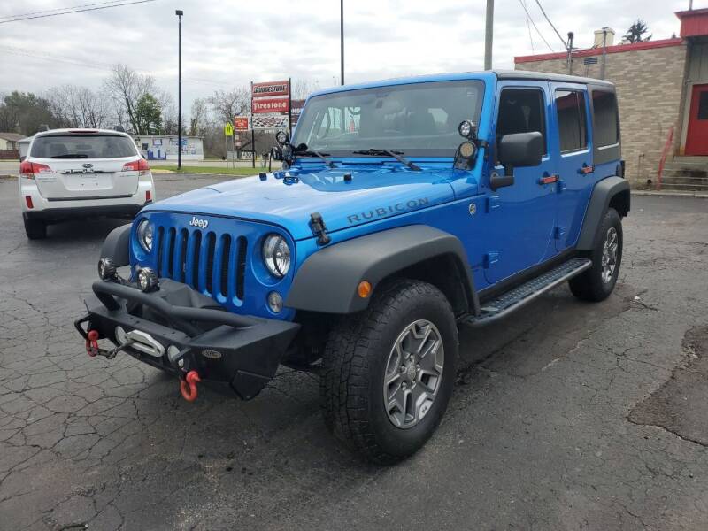 2015 Jeep Wrangler Unlimited for sale at Drive Motor Sales in Ionia MI