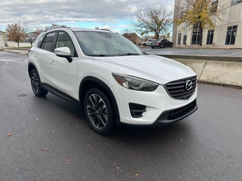 2016 Mazda CX-5 for sale at The Car-Mart in Bountiful UT