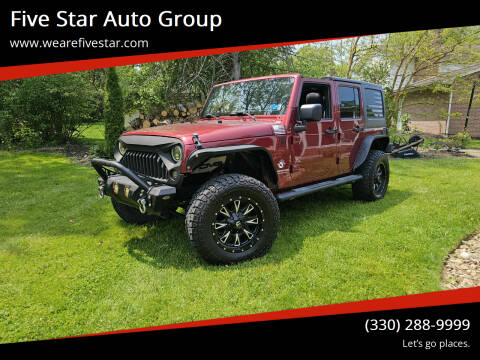 2011 Jeep Wrangler Unlimited for sale at Five Star Auto Group in North Canton OH