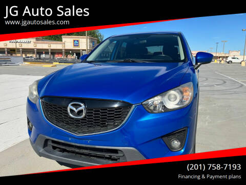 2013 Mazda CX-5 for sale at JG Auto Sales in North Bergen NJ