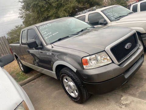 2004 Ford F-150 for sale at Buy-Fast Autos in Houston TX