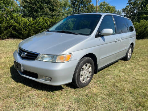 2002 Honda Odyssey for sale at PUTNAM AUTO SALES INC in Marietta OH