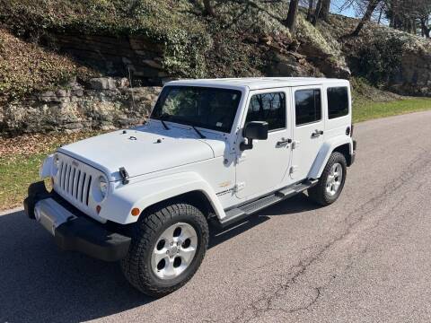 2013 Jeep Wrangler Unlimited for sale at Bogie's Motors in Saint Louis MO