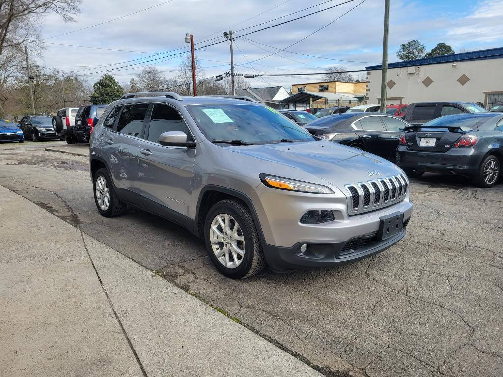 2015 Jeep Cherokee for sale at DAGO'S AUTO SALES LLC in Dalton, GA