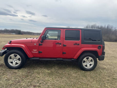 2012 Jeep Wrangler Unlimited for sale at Wendell Greene Motors Inc in Hamilton OH