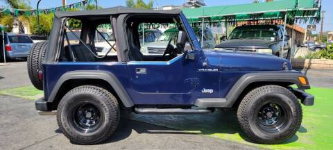 2001 Jeep Wrangler for sale at Pauls Auto in Whittier CA